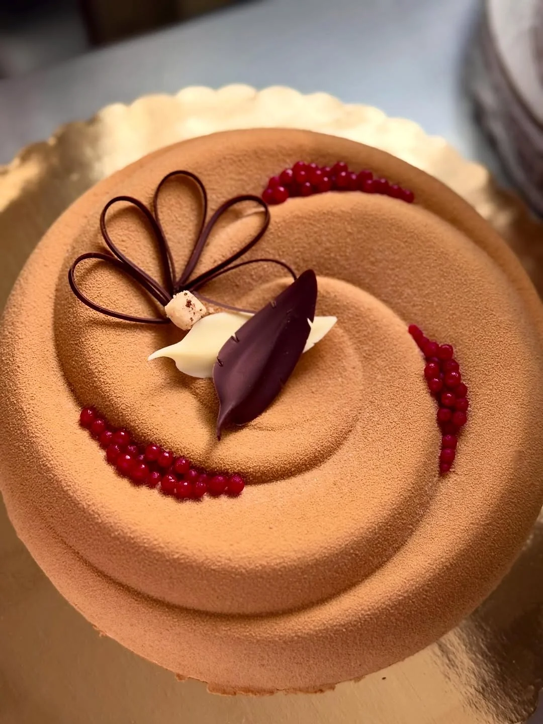 Forêt Noire Reimagined — cocoa-velvet dome over kirsch ganache and griotte cherries with chocolate loops